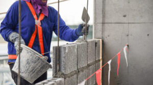Compra direta de meio bloco de concreto para obra residencial